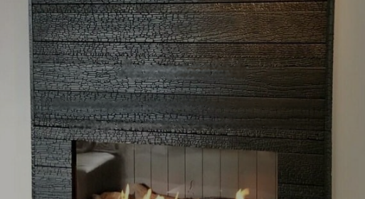 Charred timber fireplace surround