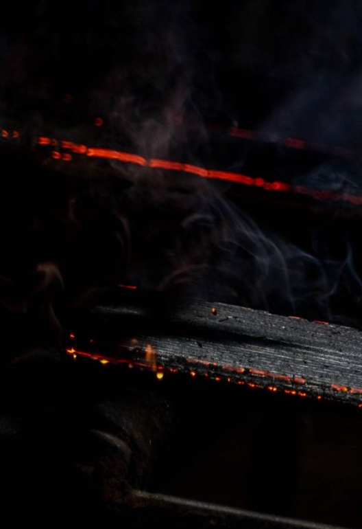 Timber boards being charred